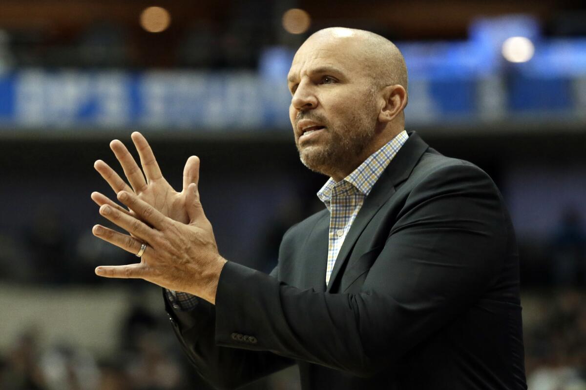 Jason Kidd instructs from the sideline during a game.