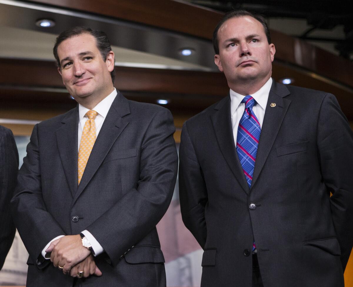 Sens. Ted Cruz (R-Texas), left, and Mike Lee (R-Utah) during a news conference with conservative congressional Republicans at the Capitol in Washington last week.