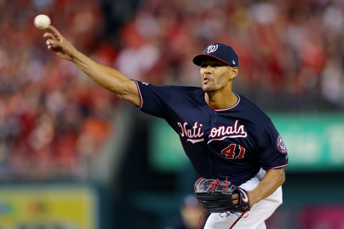 Washington Nationals starter Joe Ross delivers during the first inning of Game 5 of the World Series on Sunday.