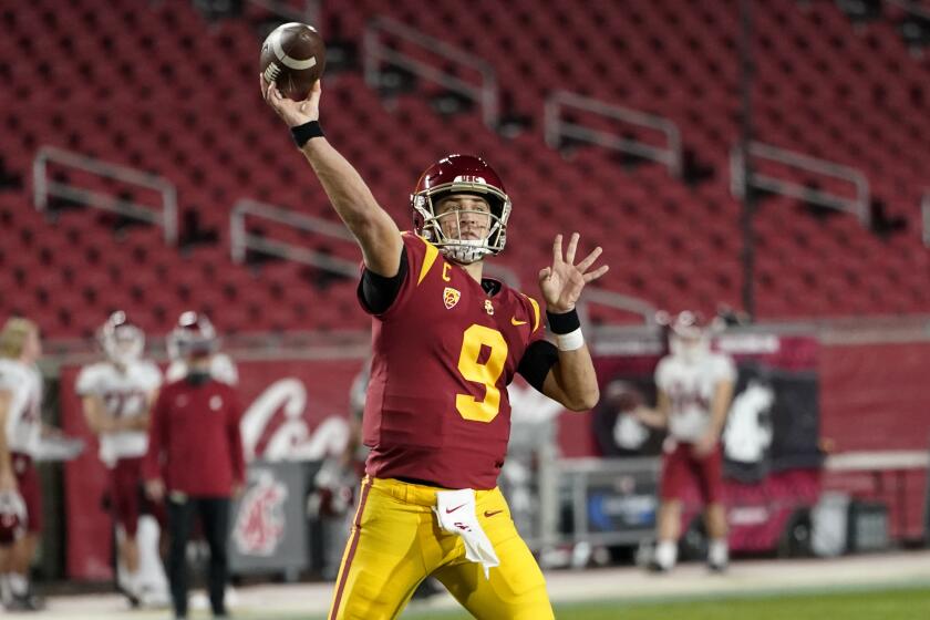 USC quarterback Kedon Slovis throws for a touchdown against Washington State.