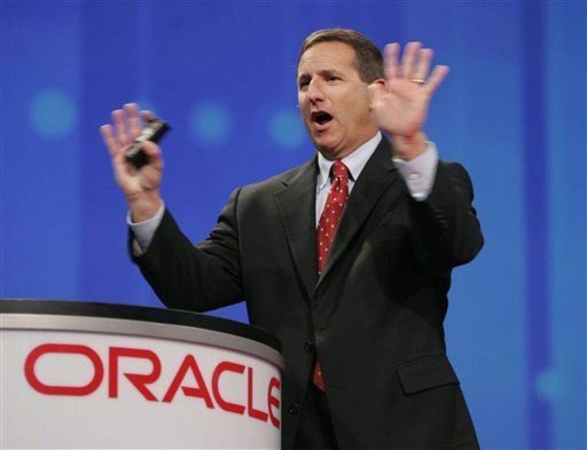 FILE - In this Oct. 24, 2006 file photo shows then, Hewlett Packard CEO Mark Hurd gestures during a keynote address at the Oracle Open World conference in San Francisco. Oracle Corp. has hired former Hewlett-Packard Co. CEO Mark Hurd to help lead the database software maker in a pivotal moment in Oracle's 33-year history as it tries to muscle in on more of HP's turf Monday, Sept. 6, 2010.(AP Photo/Paul Sakuma, file)
