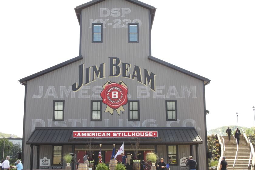FILE - This Oct. 3, 2012 file photo shows the Jim Beam visitors center at its central distillery in Clermont, Ky. Bourbon tourism reached new heights last year in Kentucky. Attendance at distilleries along the Kentucky Bourbon Trail surpassed two million in 2022 for the first time. The Kentucky Distillers’ Association made the announcement Monday, Feb. 6, 2023. (AP Photo/Bruce Schreiner, file)