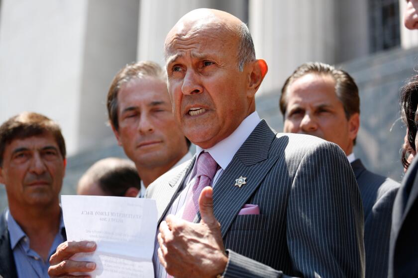 Former Los Angeles County Sheriff Lee Baca arrives at the downtown federal courthouse Aug. 1 for a sentencing hearing.