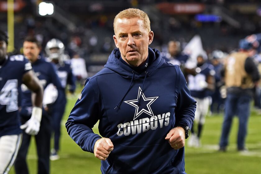 CHICAGO, ILLINOIS - DECEMBER 05: Head coach Jason Garrett of the Dallas Cowboys leaves the field following a game against the Chicago Bears at Soldier Field on December 05, 2019 in Chicago, Illinois. (Photo by Stacy Revere/Getty Images)