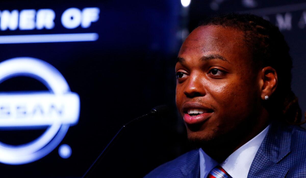 Alabama running back Derrick Henry speaks to the media prior to the 2015 Heisman Trophy Presentation on Saturday.