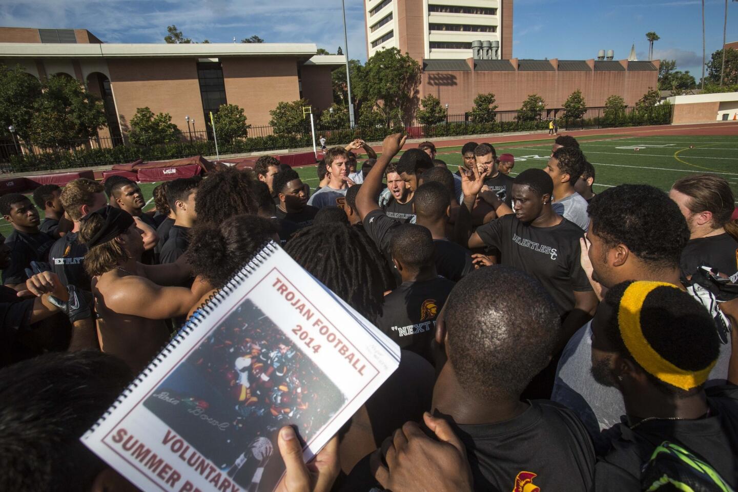 USC players gather for a voluntary workout at Katherine B. Loker Stadium on the USC campus on July 18.