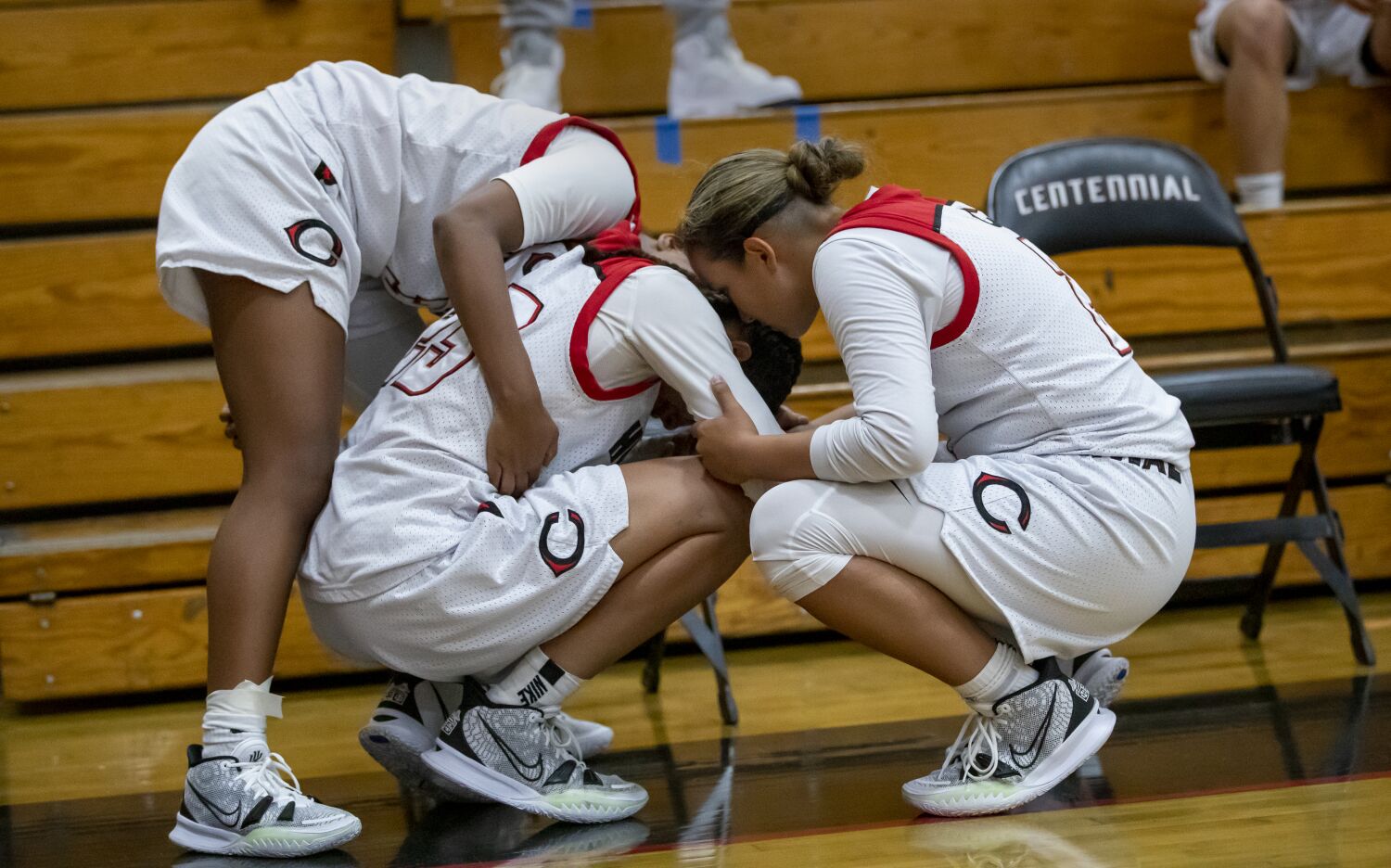 Man punched several girls' basketball players during game, brandished a gun, police say