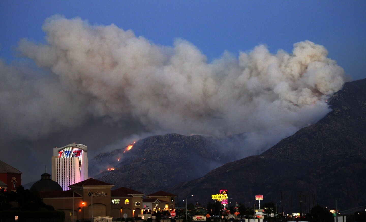 The Silver fire burns east toward wind turbines and a view of Morongo Casino, Resort & Spa in Cabazon.