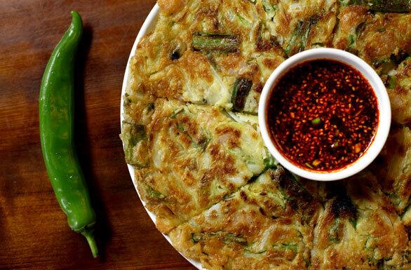 The seafood pancake with chile sauce at Jun Won in Koreatown.