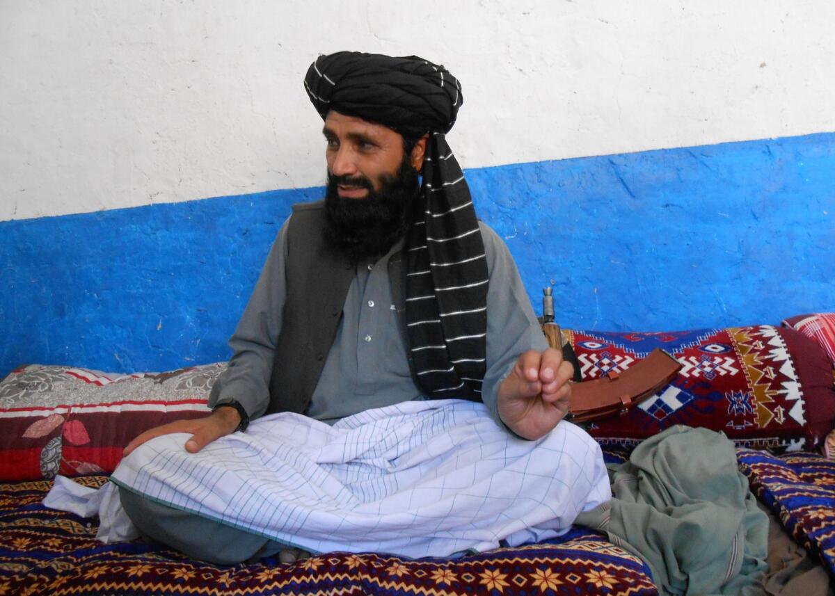 Azam Tariq, spokesman for a breakaway faction of the Pakistani Taliban, talks with reporters in North Waziristan.