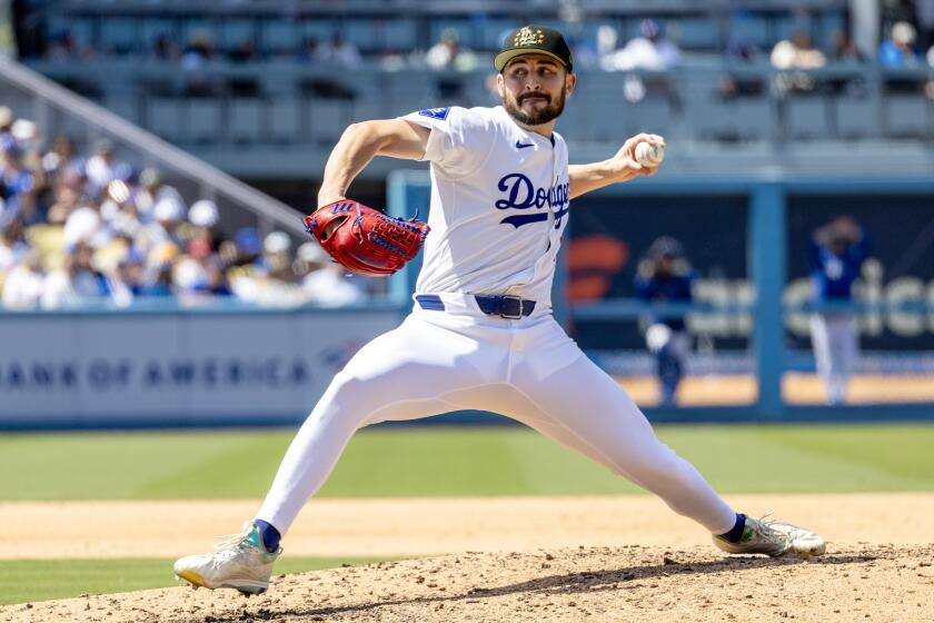 LOS ANGELES, CA - MAY19, 2024: Los Angeles Dodgers pitcher Alex Vesia (51) pitches in relief against the Cincinnati Reds In the seventh inning at Dodger Stadium on May 19, 2024 in Los Angeles, California.(Gina Ferazzi / Los Angeles Times)