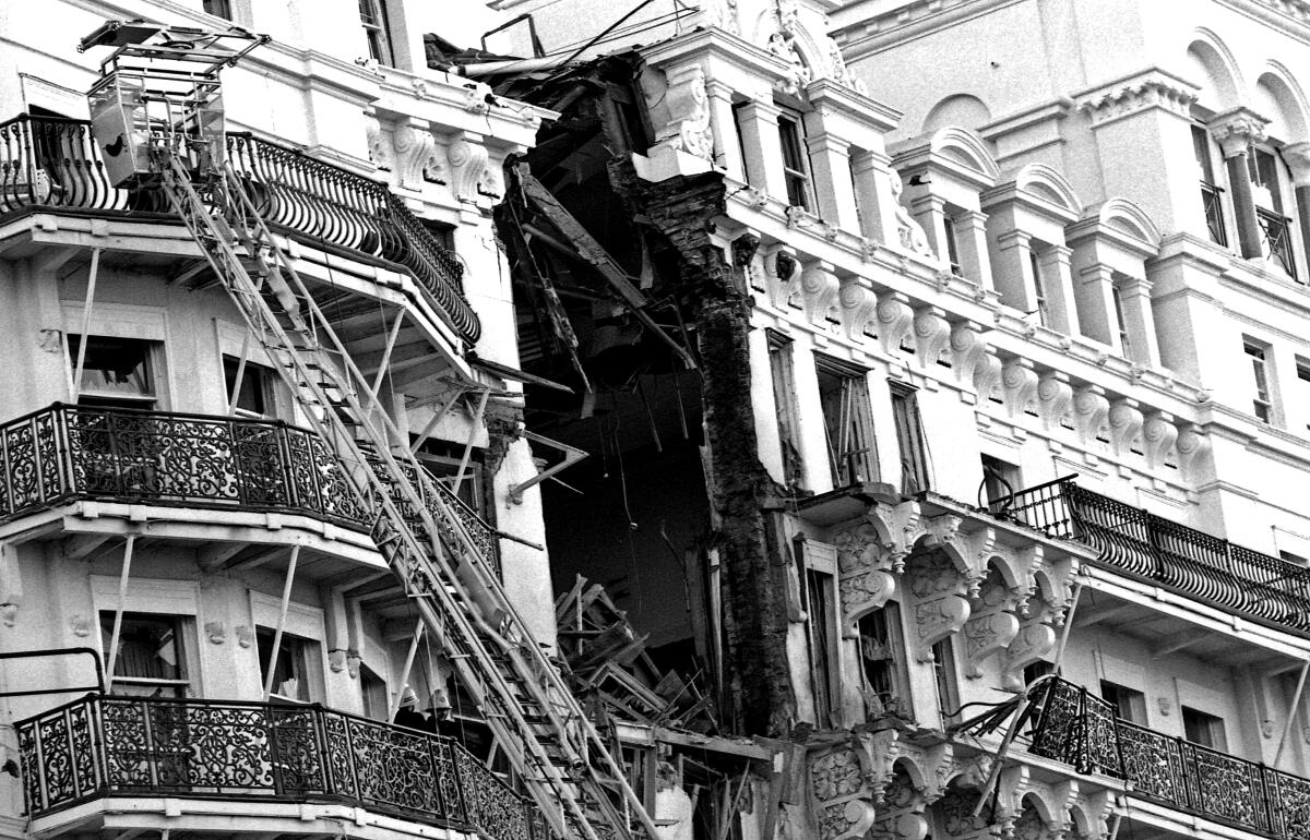The Grand Hotel’s ruined facade hours after Patrick Magee’s bomb detonated on the sixth floor in October 1984.