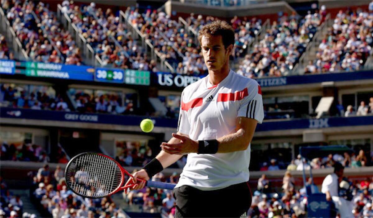 Defending U.S. Open champion Andy Murray fell to ninth-seeded Stanislas Wawrinka, 6-4, 6-3, 6-2, in a quarterfinal match Thursday.