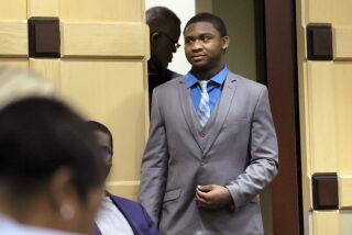 Suspected shooting accomplice Trayvon Newsome enters the courtroom while the jury deliberates in the XXXTentacion murder trial at the Broward County Courthouse in Fort Lauderdale, Fla., Friday, March 10, 2023. Emerging rapper XXXTentacion, born Jahseh Onfroy, 20, was killed during a robbery outside of Riva Motorsports in Pompano Beach in 2018, allegedly by defendants Michael Boatwright, Newsome and Dedrick Williams. (Mike Stocker/South Florida Sun-Sentinel via AP, Pool)