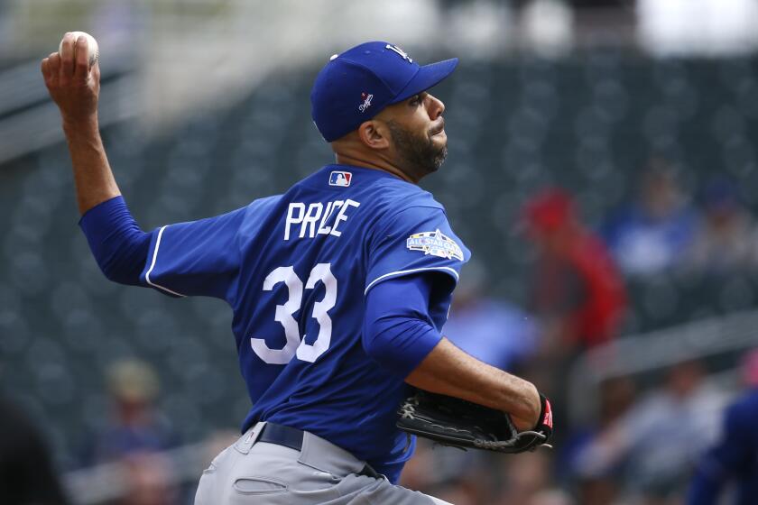 Los Angeles Dodgers starting pitcher David Price throws against the Cincinnati Reds during the first inning of a spring training baseball game Monday, March 2, 2020, in Goodyear, Ariz. (AP Photo/Ross D. Franklin)