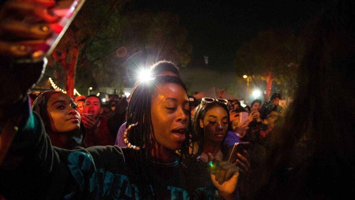 Concertgoers groove to the sounds of Erykah Badu at Soulquarius in Santa Ana.