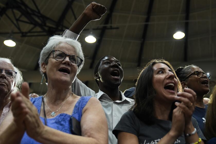 Attendees cheer during a campaign event for Democratic presidential candidate Vice President Kamala Harris in Ambler, Pa., Monday, July 29, 2024. (AP Photo/Matt Rourke)