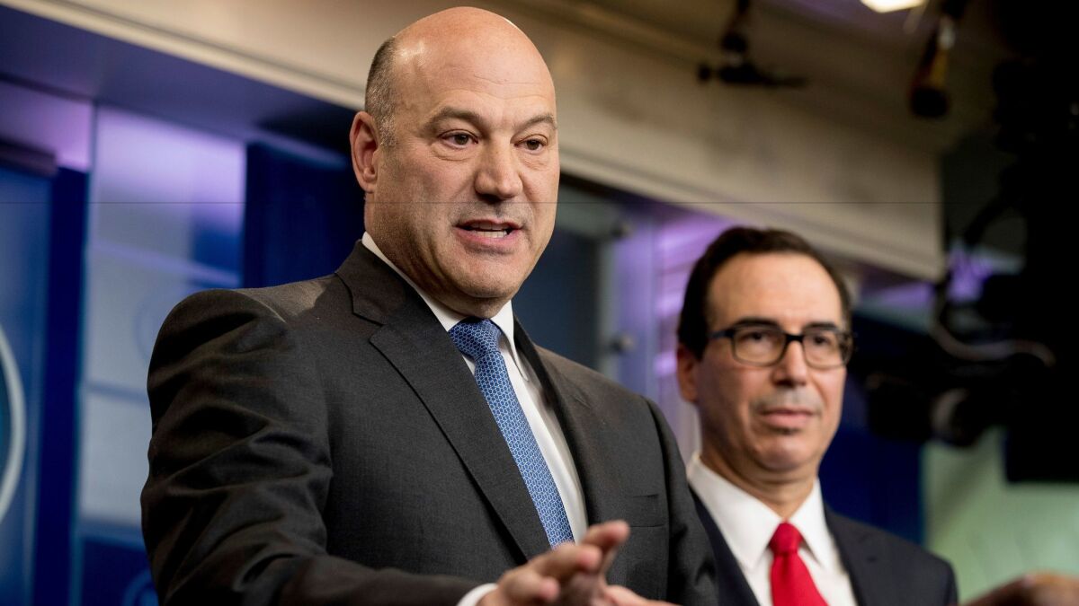 National Economic Director Gary Cohn, left, and Treasury Secretary Steve Mnuchin introduce the Trump tax outline.