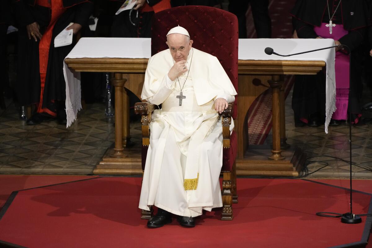 Pope Francis seated