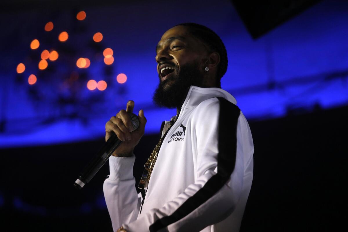 The late rapper Nipsey Hussle, nominated for three Grammy awards.
