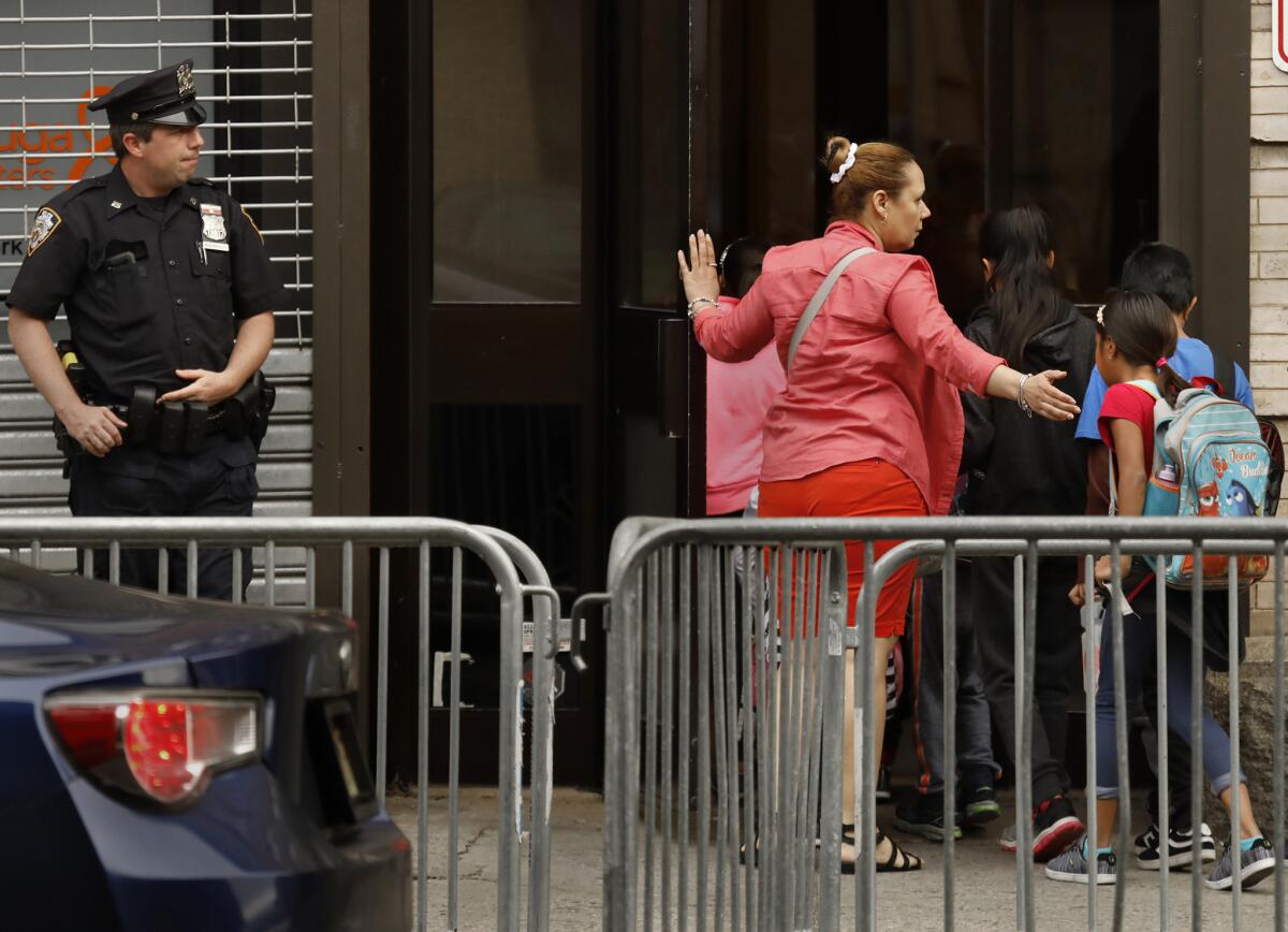 Children enter Cayuga Center in East Harlem.