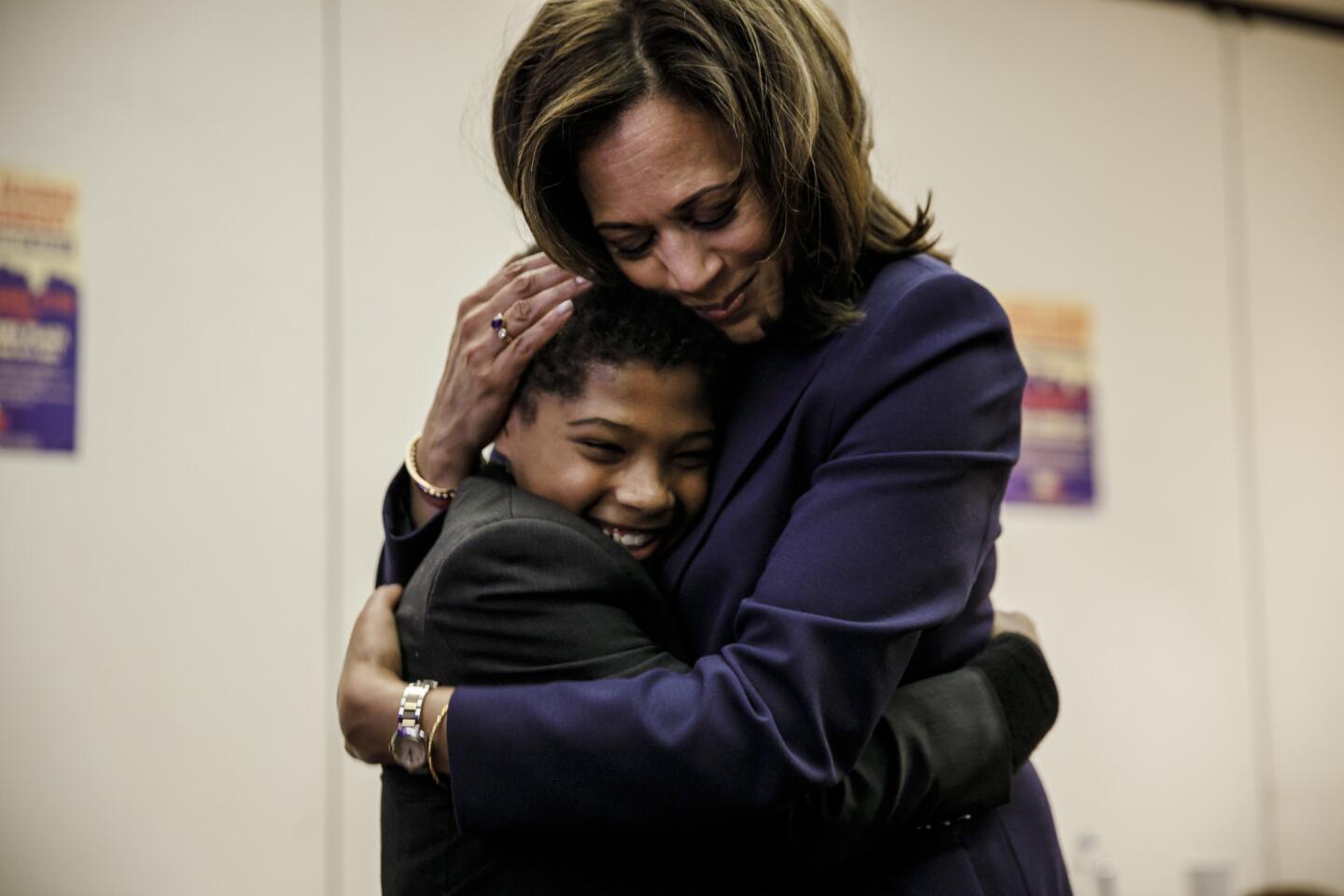 Kamala Harris hugs her godson before her presidential campaign kickoff speech.