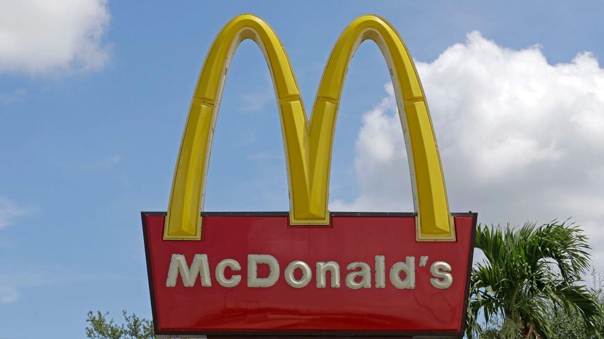 McDonald's in Canada will offer children's books with Happy Meals.