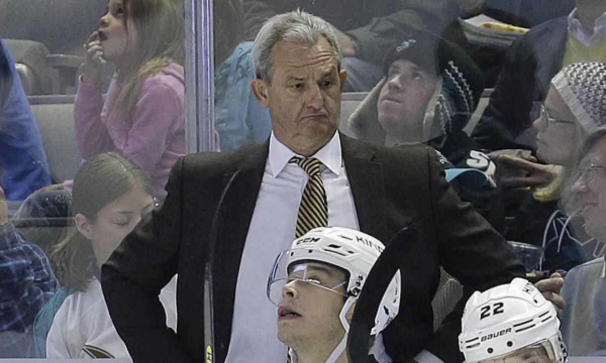 Kings Coach Darryl Sutter looks on during a game against the San Jose Sharks on April 3. While Sutter has adjusted his approach to coaching over the years, the Kings still share some similarities to the first NHL team he coached more than two decades ago.
