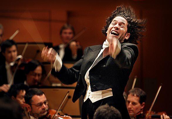 Venezuelan conductor Gustavo Dudamel leads the L.A. Philharmonic in a three-part program that featured pianist Yefim Bronfman.