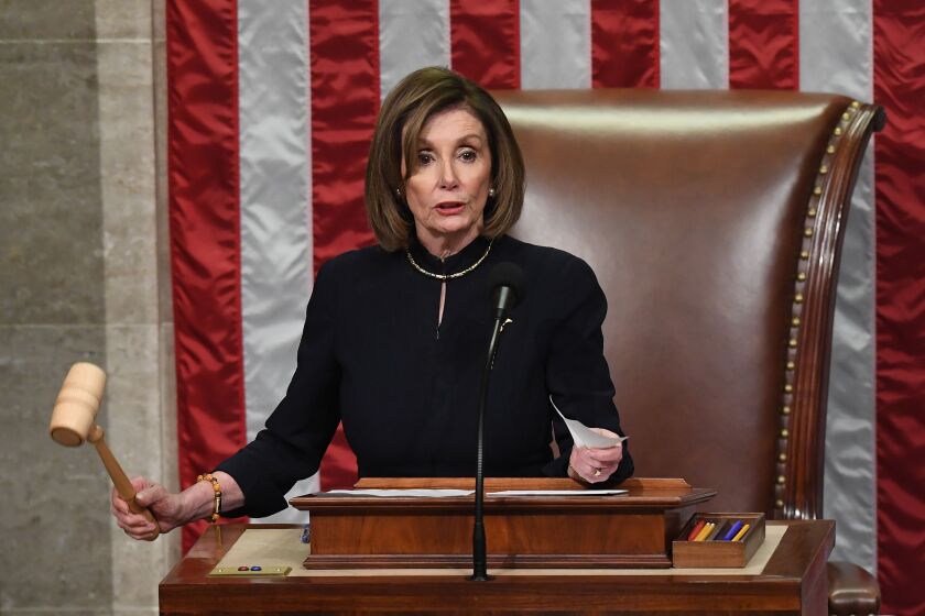 US Speaker of the House Nancy Pelosi presides over Resolution 755, Articles of Impeachment Against President Donald J. Trump as the House votes at the US Capitol in Washington, DC, on December 18, 2019. (Photo by SAUL LOEB / AFP) (Photo by SAUL LOEB/AFP via Getty Images) ** OUTS - ELSENT, FPG, CM - OUTS * NM, PH, VA if sourced by CT, LA or MoD **