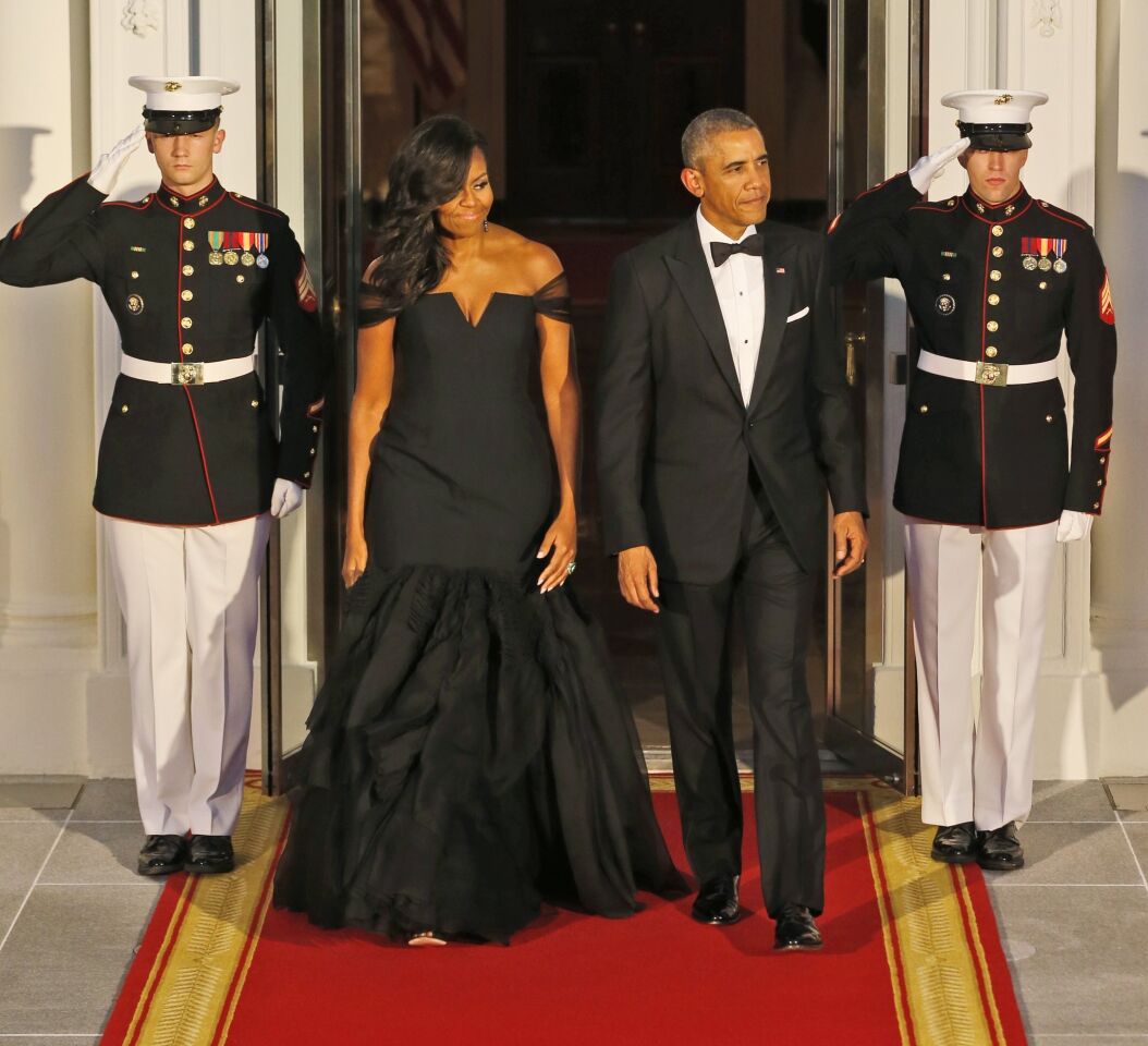 For the Sept. 25, 2015, state dinner honoring Chinese President Xi Jinping, the first lady went with a black silk crepe mermaid gown by Vera Wang, an American designer whose parents had immigrated from China.