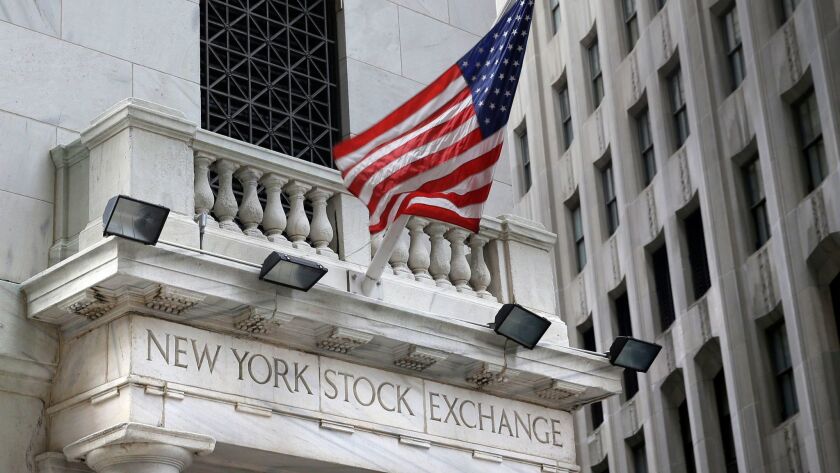 A flag flies from the New York Stock Exchange.
