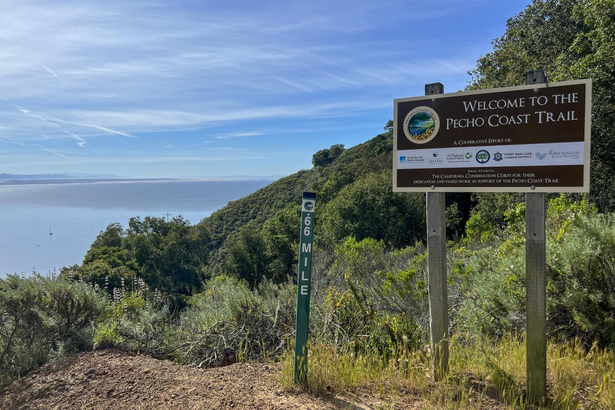 A sign marks Echo Coast trail in Avila Beach, overlooking the ocean.