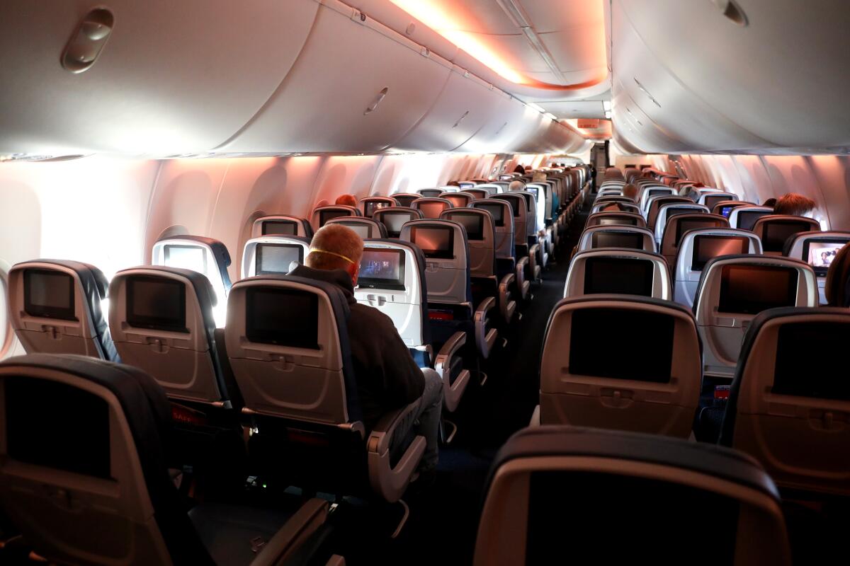 Passengers on a nearly empty plane