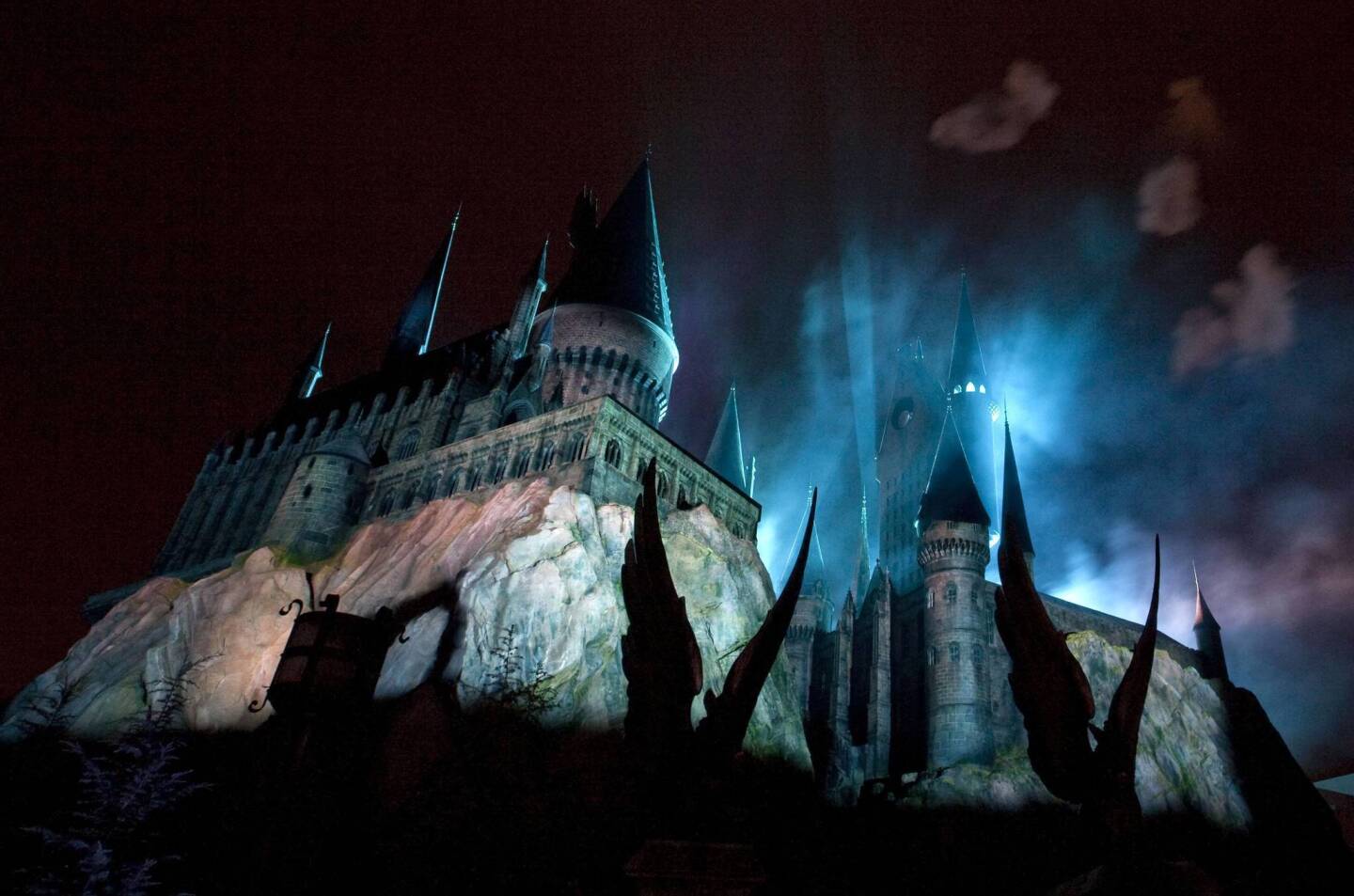Smoke filters through Hogwarts Castle during the grand opening celebration for The Wizarding World of Harry Potter in Orlando