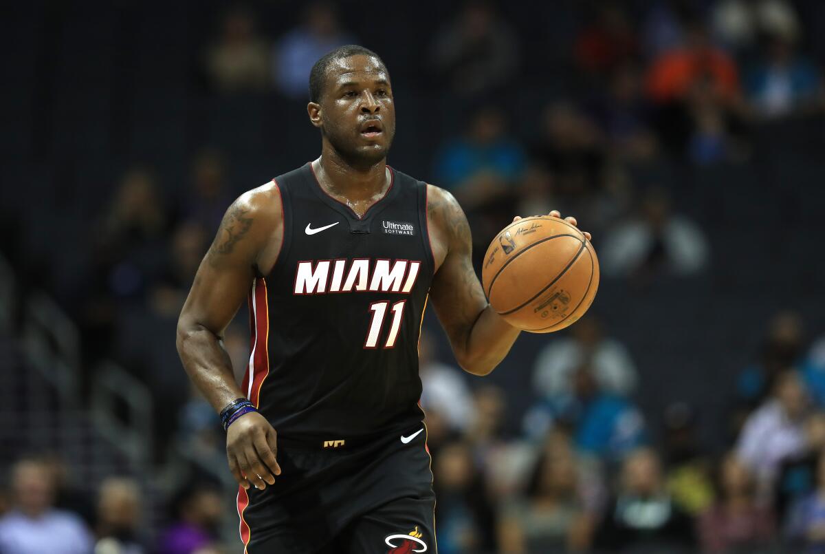 Miami's Dion Waiters brings the ball up court during a preseason game against the Hornets in Charlotte, N.C., on Oct. 9, 2019.