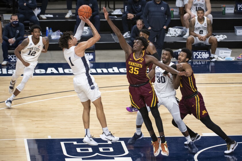 Penn State forward Seth Lundy (1) shoots against Minnesota during an NCAA college basketball game Wednesday, March 3, 2021, in State College, Pa. (Noah Riffe/Centre Daily Times via AP)