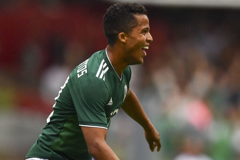 Mexico's Giovani Dos Santos celebrates after scoring against Scotland during their international friendly football match at the Azteca stadium in Mexico City, on June 2, 2018. / AFP PHOTO / YURI CORTEZYURI CORTEZ/AFP/Getty Images ** OUTS - ELSENT, FPG, CM - OUTS * NM, PH, VA if sourced by CT, LA or MoD **