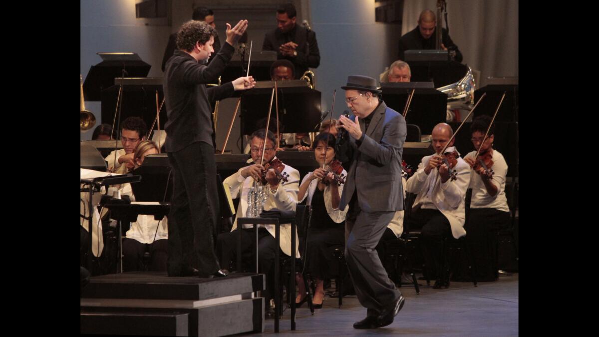 Gustavo Dudamel conducts the L.A. Phil with salsa star Ruben Blades at the Hollywood Bowl.