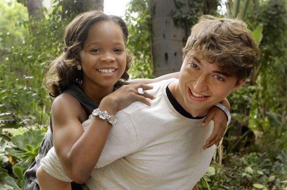 Director Benh Zeitlin gives his young star Quvenzhane Wallis of "Beasts of the Southern Wild" a piggyback ride.