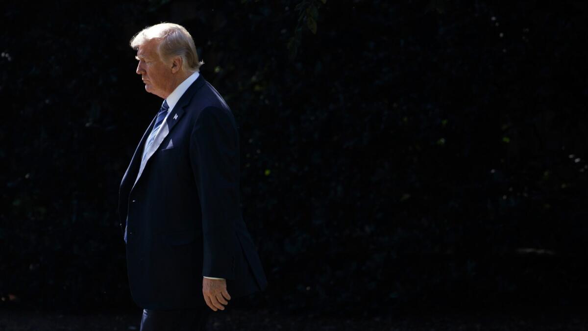 President Donald Trump walks to board Marine One on the South Lawn of the White House on Sept. 6.