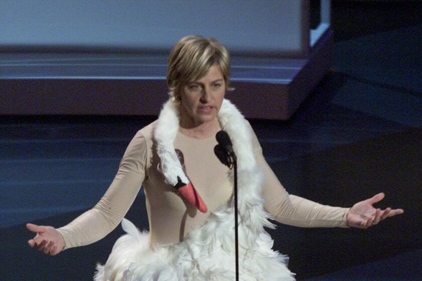 Ellen DeGeneres in a outfit spoofing Bjork's swan attire from the Oscars at the 53d Annual Primetime Emmy Awards Show.