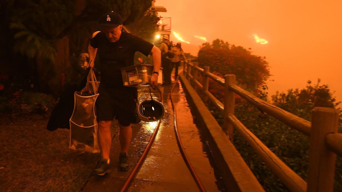 Resident Brett Hammond evacuates in Malibu as the Woolsey fire approaches.