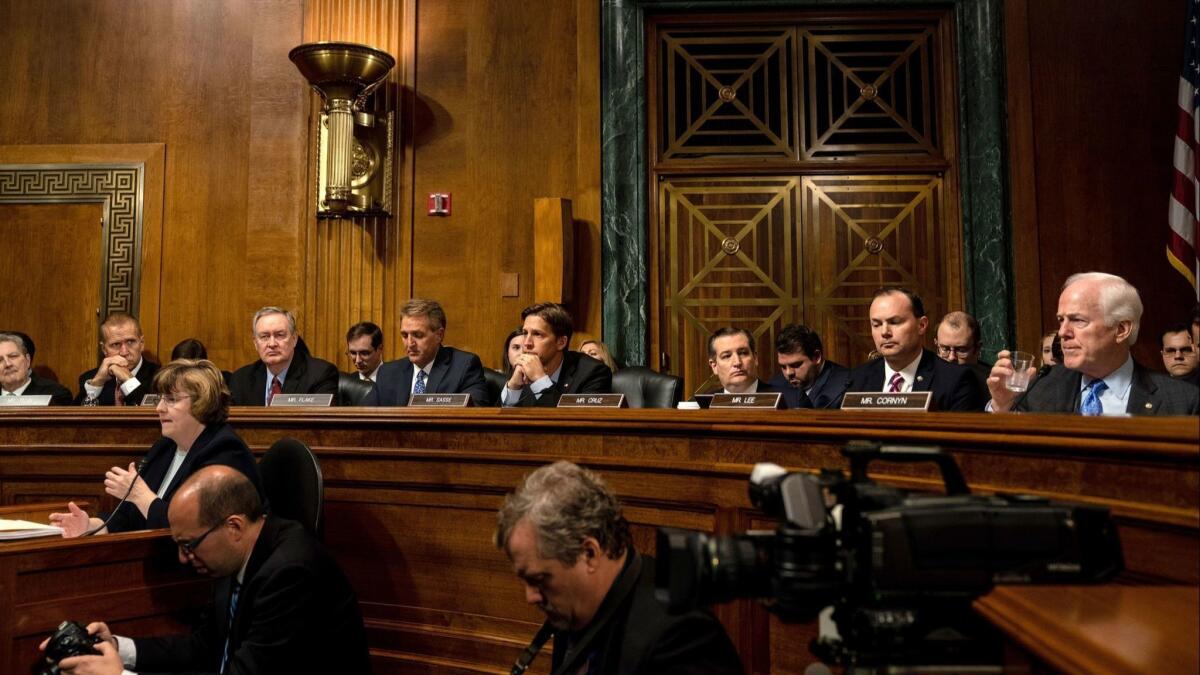 Senate Judiciary Committee Republicans listen during a hearing on Sept. 27.