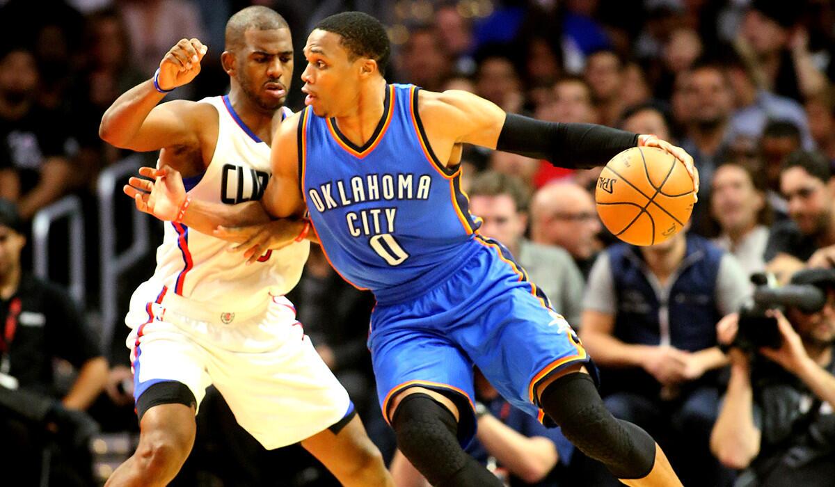 Point guard Chris Paul and the Clippers will have their hands full Monday trying to slow down Thunder point guard Russell Westbrook (0).