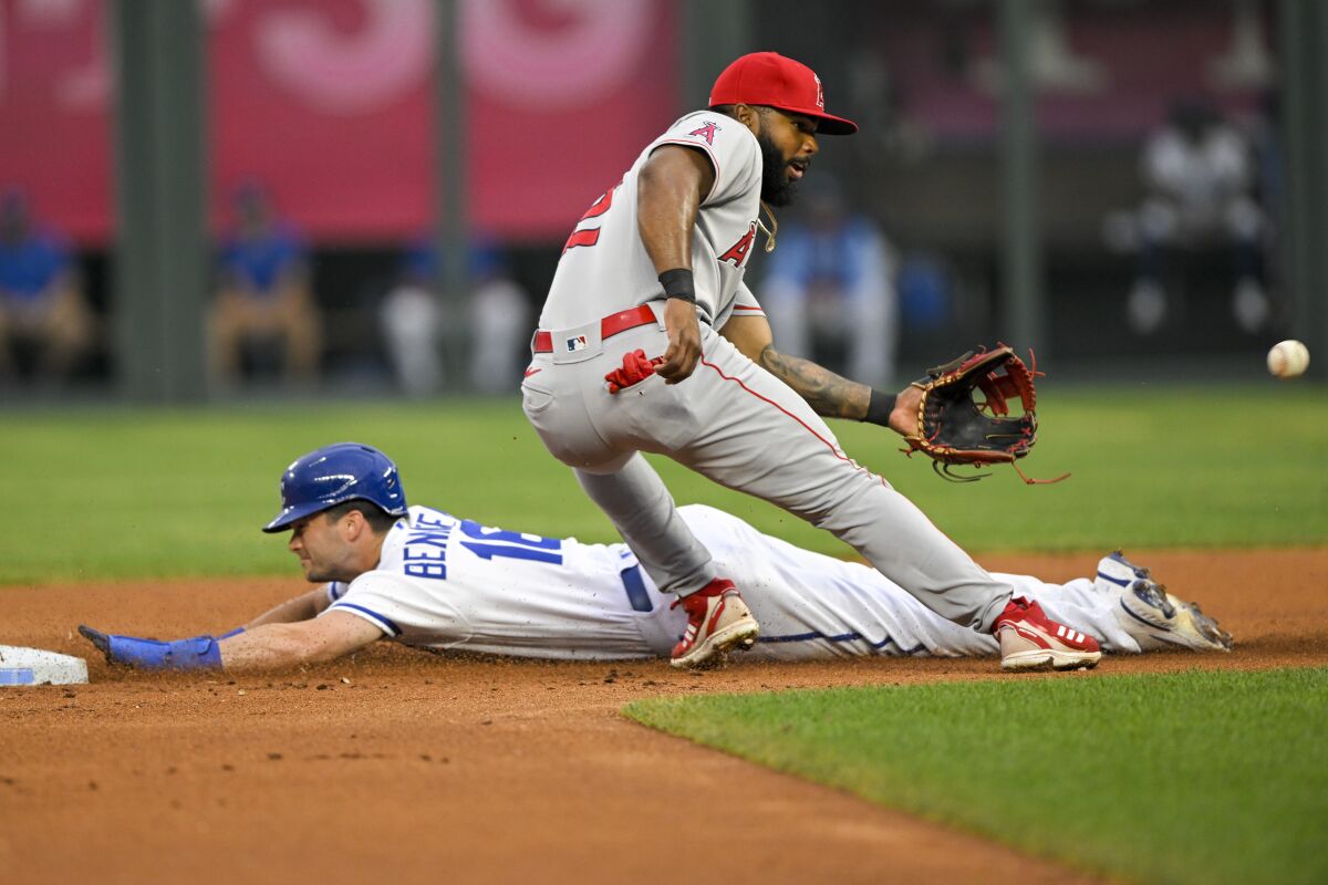 Kansas City Royals' Andrew Benintendi steals second ahead of the throw to Angels second baseman Luis Rengifo.