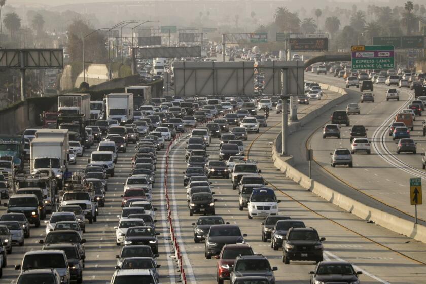 LOS ANGELES CA OCTOBER 12, 2017 --- For nearly five years, the 110 Freeway's carpool lanes have been open to solo drivers who want to avoid bumper-to-bumper traffic. But that privilege comes at a price. Driving the 11-mile toll route from the 105 Freeway to downtown Los Angeles can cost $20 or more during the most congested periods of morning rush hour - for the drivers who actually pay, that is. On any given morning, more than 25% of drivers in the toll lanes have evaded the single-driver toll, a problem that has become the top issue for Metropolitan Transportation Authority's traffic officials. The high scofflaw rate has harmed the efficiency of the lanes, driving up prices and slowing down speeds for the customers who did pay to enter, they said. (Irfan Khan / Los Angeles Times)