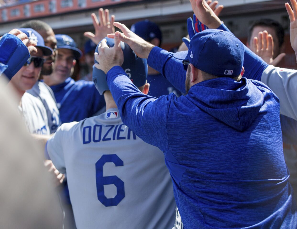 Los Angeles Dodgers Brian Dozier, #6, celebrates after he hit a two-run homer against the San Francisco Giants in the third inning of a baseball game in San Francisco, Sunday, Sept. 30, 2018.
