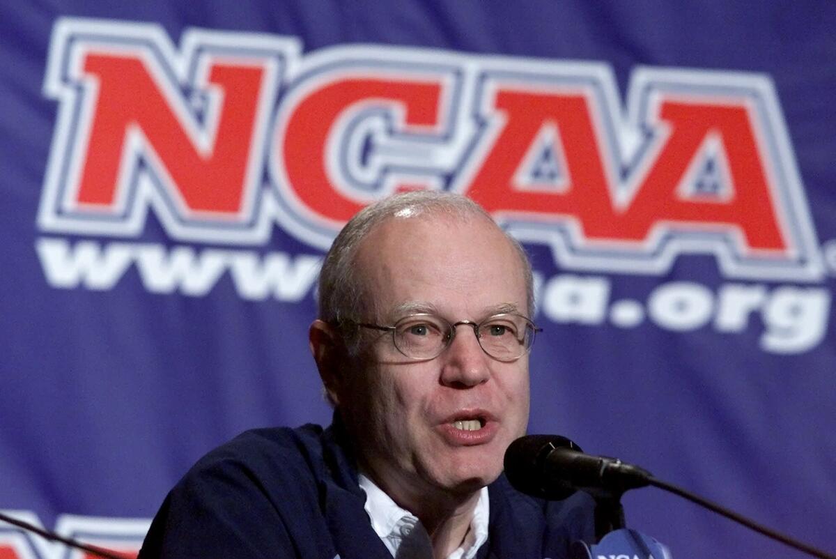 Bill Guthridge speaks during a news conference in Austin, Texas, on March 25, 2000.