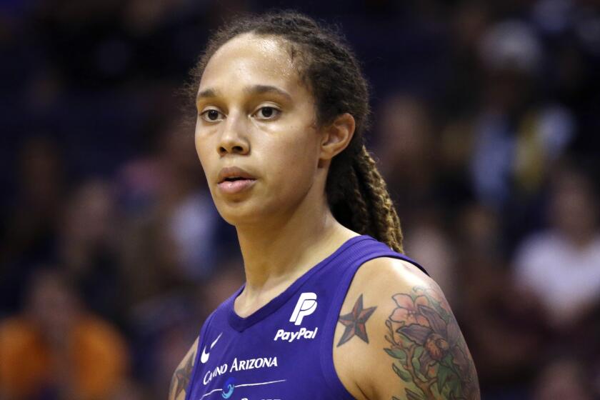 Phoenix Mercury center Brittney Griner pauses on the court during the second half of a WNBA basketball game